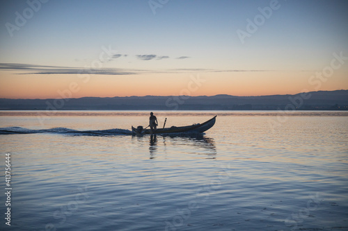 fisherman starting to work in Aveiro's River photo