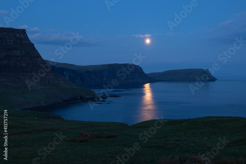 Moonrise over Waterstein head and Moonen Bay, Neist Point, Isle of Skye, Scotland photo