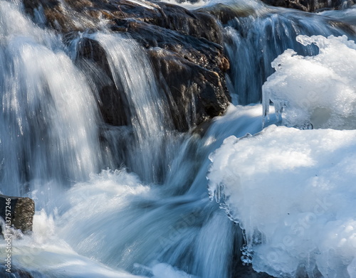 A small waterfall on the river in the spring