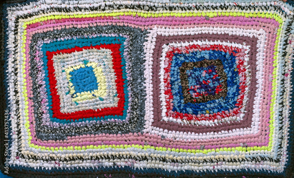 Crocheted by hand from strips of fabric rugs closeup Crocheted by hand from strips of fabric rugs closeup