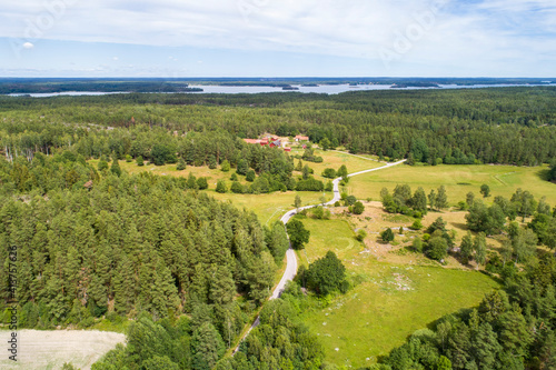 Aerial of old highway in the Kalmar in summer with Achipelago photo