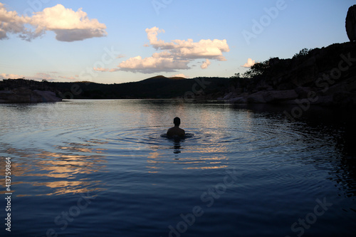 Wallpaper Mural Silhouette man in lake against sky Torontodigital.ca
