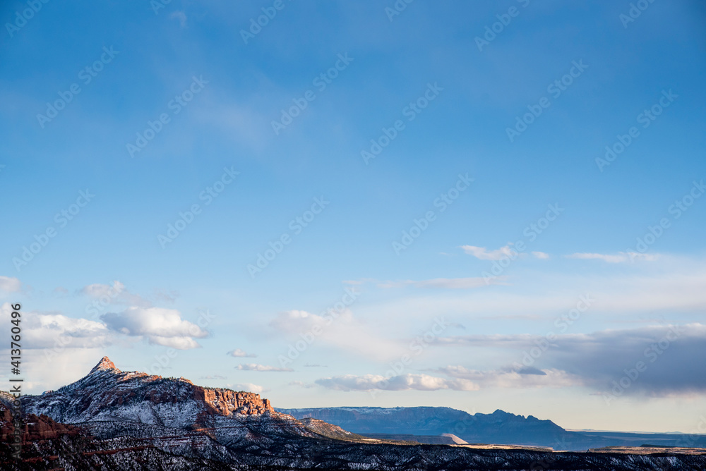 Tranquil view of rock formations at desert against sky during winter Tranquil view of rock formations at desert against sky during winter