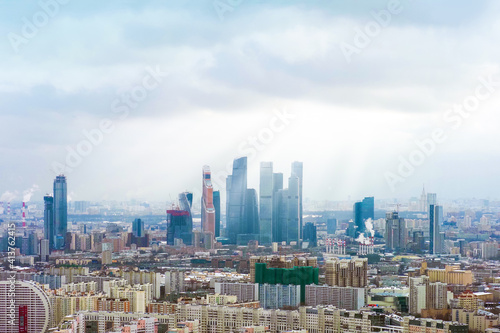 Aerial view of winter Moscow, skyline. Residential and financial developments, Moscow Sity business center, sunlight. Skyscrapers on the background