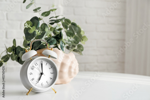 Alarm clock with floral dec...