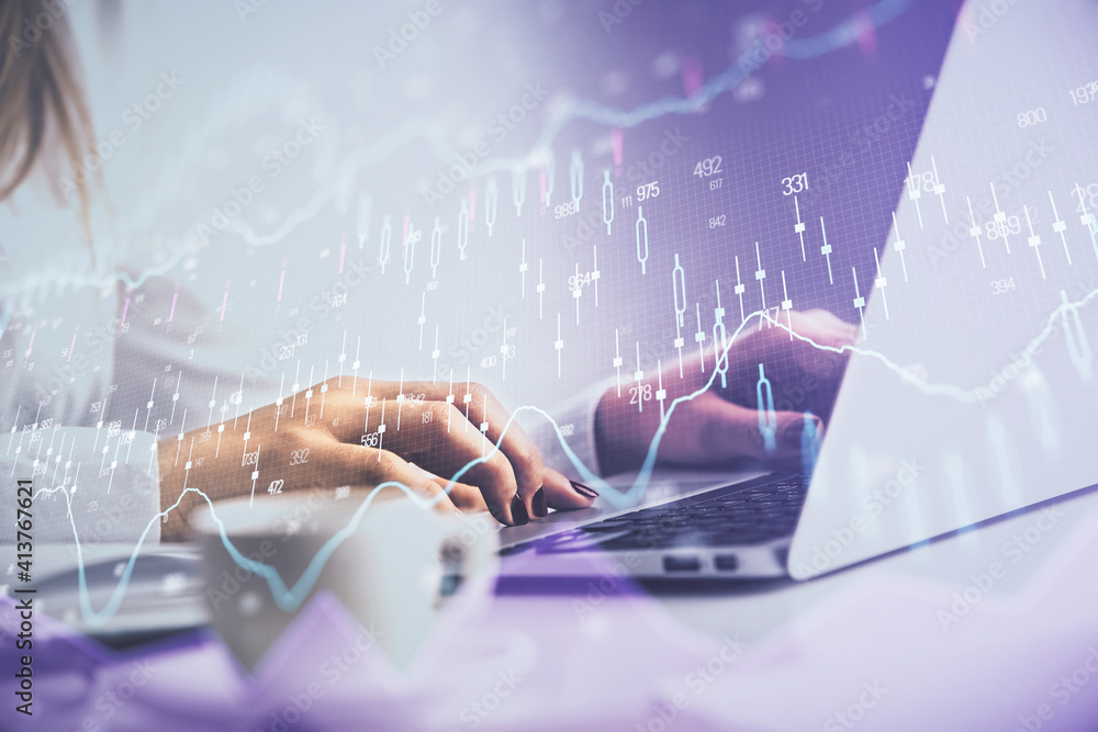 Double exposure of woman hands working on computer and forex graph hologram drawing. Financial analysis concept. Double exposure of woman hands working on computer and forex graph hologram drawing. Financial analysis concept.