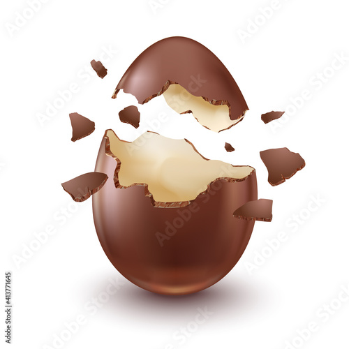 Chocolate egg, child's surprise for Easter and holidays, broken.