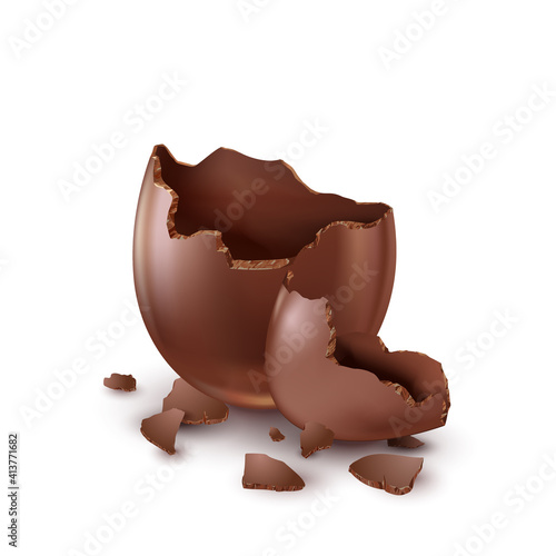 Chocolate egg, child's surprise for Easter and holidays, broken.