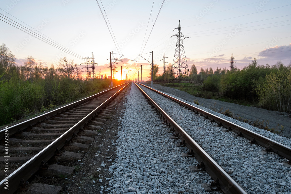 View of railroad tracks during sunset View of railroad tracks during sunset