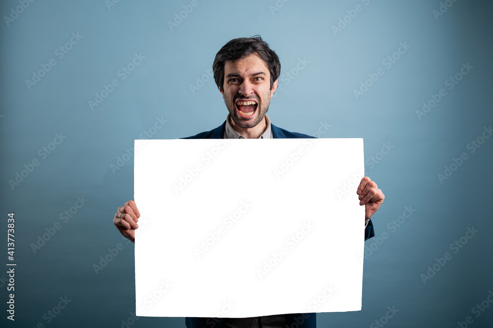Screaming mad man holding blank poster. People with requirements and demands Screaming mad man holding blank poster. People with requirements and demands
