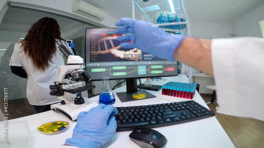 POV of scientists team worried about virus evolution discussing in modern equipped laboratory. Medical stuff examining vaccine development using high tech researching treatment against covid19 virus POV of scientists team worried about virus evolution discussing in modern equipped laboratory. Medical stuff examining vaccine development using high tech researching treatment against covid19 virus