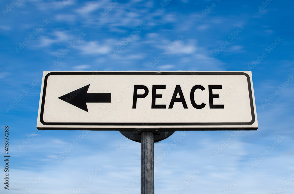 Peace road sign, arrow on blue sky background. One way blank road sign with copy space. Arrow on a pole pointing in one direction. Peace road sign, arrow on blue sky background. One way blank road sign with copy space. Arrow on a pole pointing in one direction.