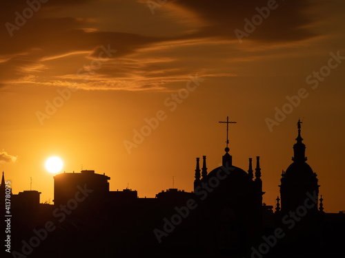 Beautiful sunset in Bilbao, city of the Basque country, with the silhouette of the church of San Anton.