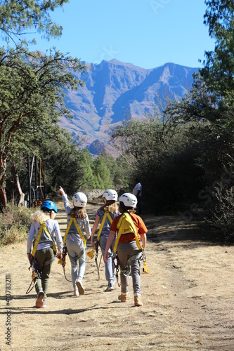 group of kids hiking in mountain