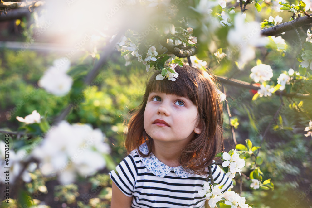 Beautiful little girl in the garden Beautiful little girl in the garden
