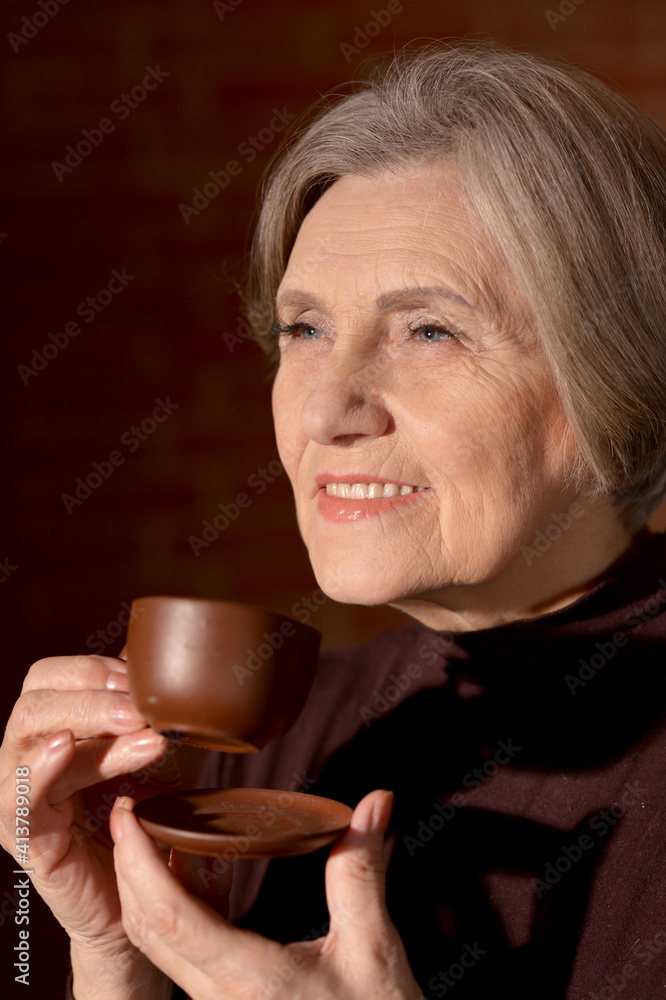 beautiful smiling senior woman drinking tea beautiful smiling senior woman drinking tea