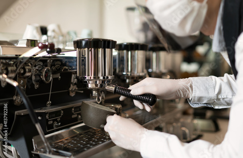 Barista make hot coffee, Worker making coffee by modern coffee machine