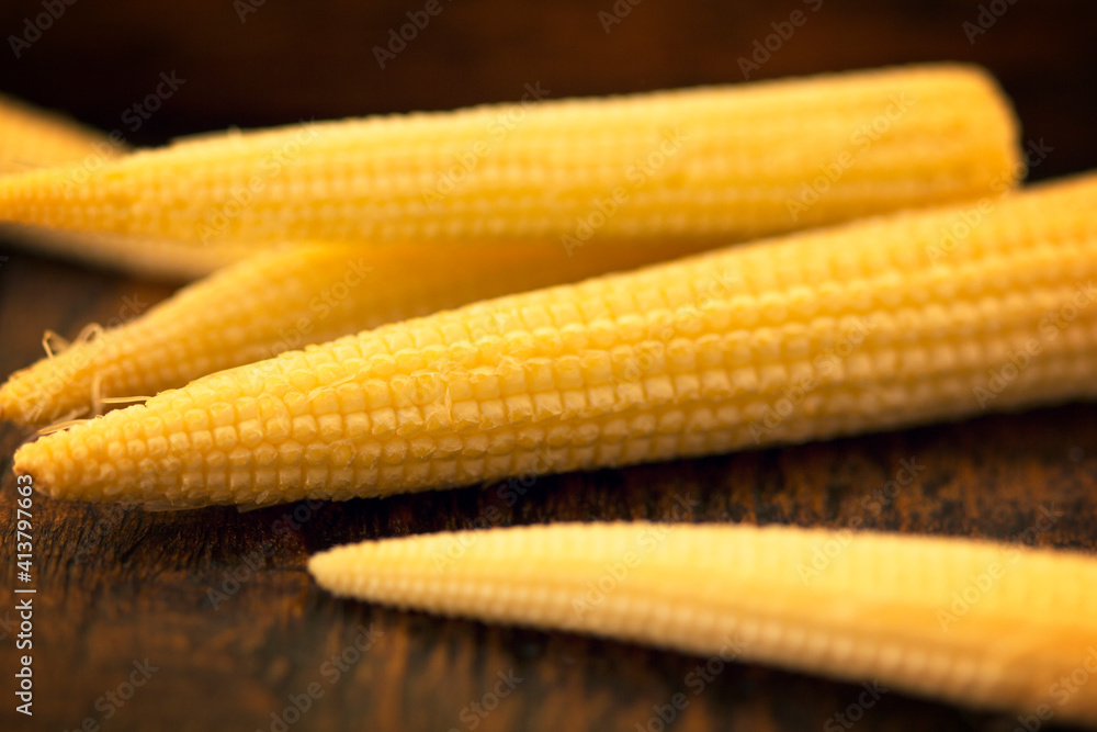 Close-up of baby corns on table Close-up of baby corns on table