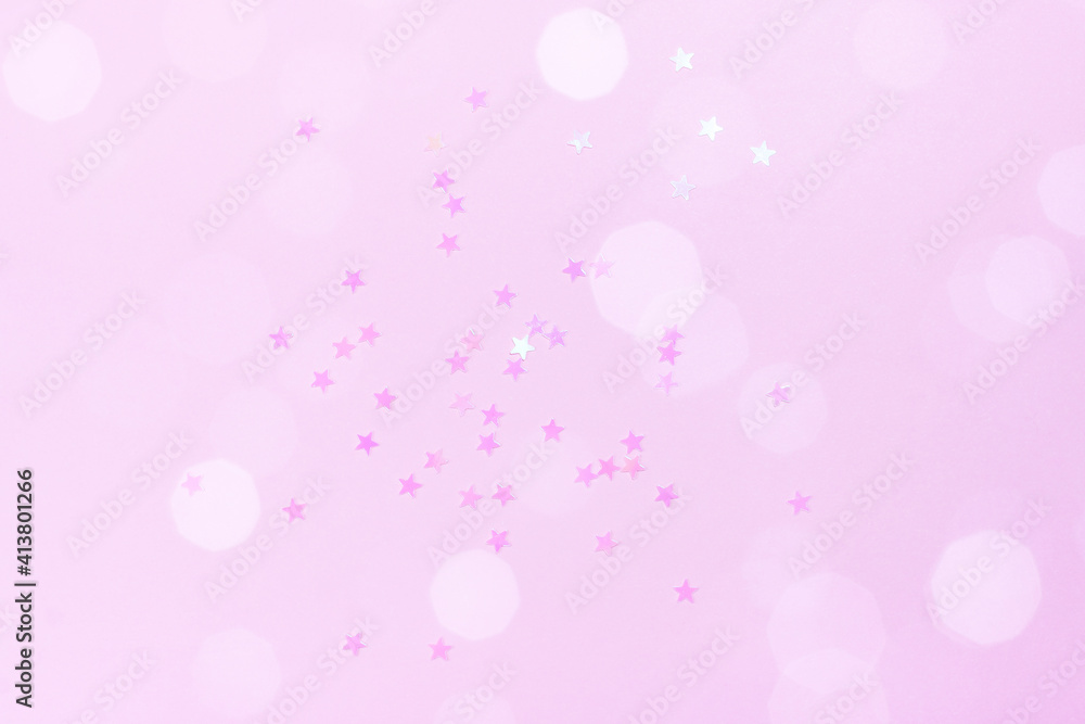 Delicate pink background with stars. The concept of femininity, fragility, women's day, the Day of St. Valentine, Christmas, New Year, holiday, birthday, etc. Delicate pink background with stars. The concept of femininity, fragility, women's day, the Day of St. Valentine, Christmas, New Year, holiday, birthday, etc.