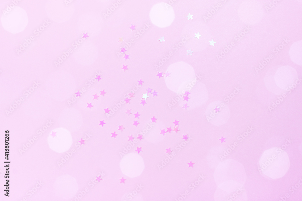 Delicate pink background with stars. The concept of femininity, fragility, women's day, the Day of St. Valentine, Christmas, New Year, holiday, birthday, etc.