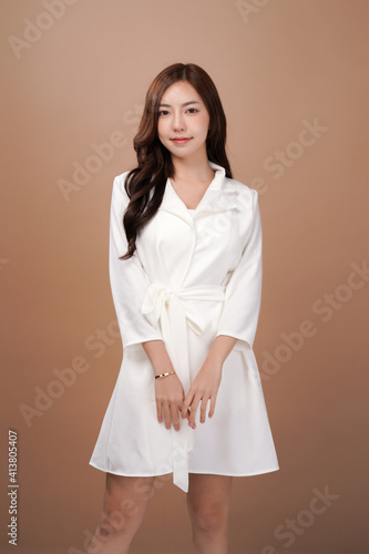 Asian woman, Business casual outfit, mocha background