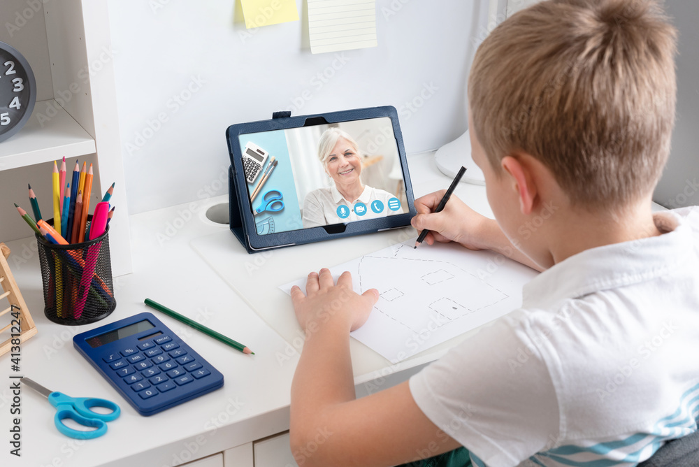 Remote learning concept with boy using tablet Remote learning concept with boy using tablet