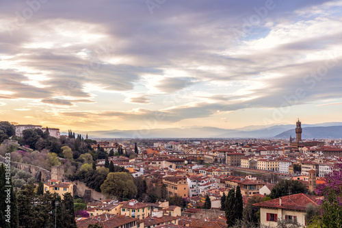 Panoramic view of Florence skyline at Sunset with famous Palazzo Vecchio and Ponte Vecchio. Tuscany, Italy