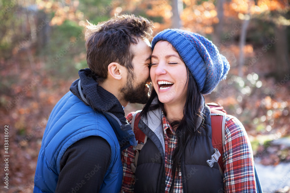 Cheerful couple standing on field Cheerful couple standing on field