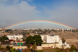 Rainbow over Maale-Adomim city, Israel .