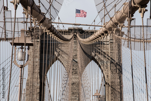 Flag on Brooklyn Bridge in NYC photo