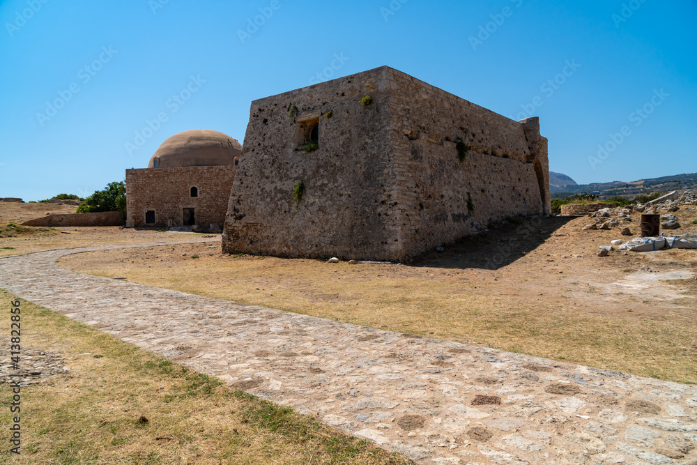 Ancient buildings inside Rethymno Castle including Ottoman mosque in Crete, Greece