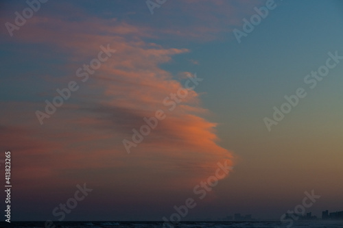 orange clouds over the beach © rohnie