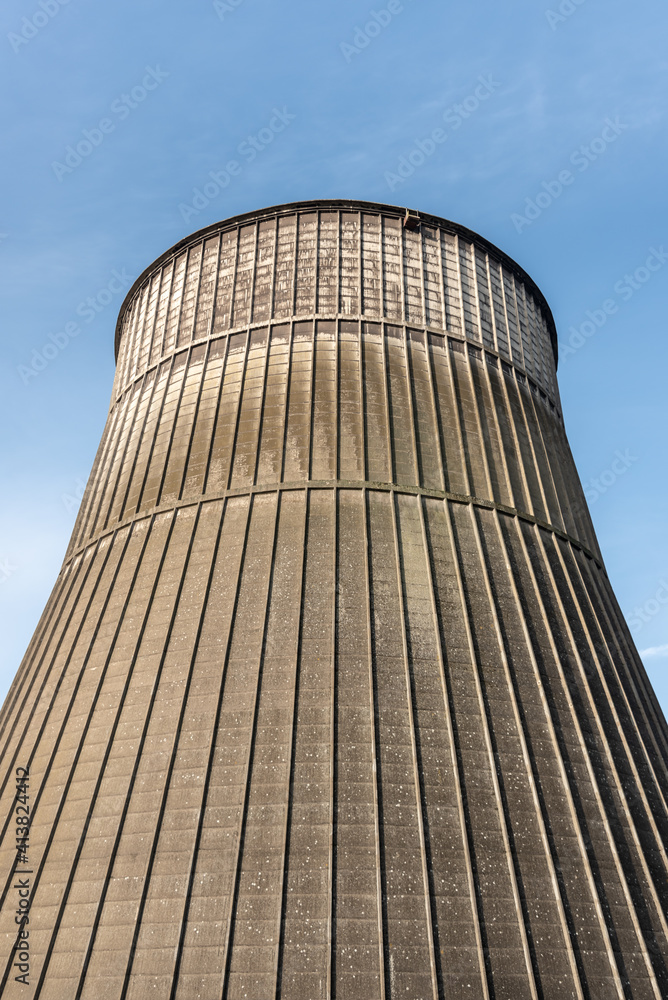 Cooling tower up against a blue sky