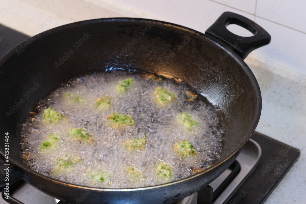 close up frying meatballs in oil. Traditional Chinese food close up frying meatballs in oil. Traditional Chinese food
