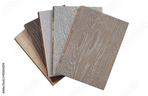 engineered hardwood or laminate flooring swatch samples in various type of wood texture, isolated on white background with clipping path. interior wooden flooring  swatch use for material board.