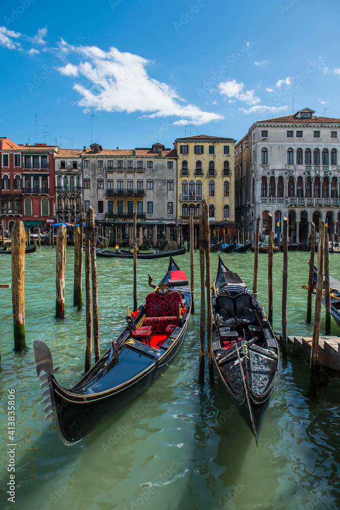 Gondolas parked at canal grande in Venice Gondolas parked at canal grande in Venice