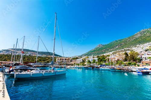 Kalkan Marina view from sea. Kalkan is a town on the Turkish Mediterranean coast, and an important tourist destination. photo