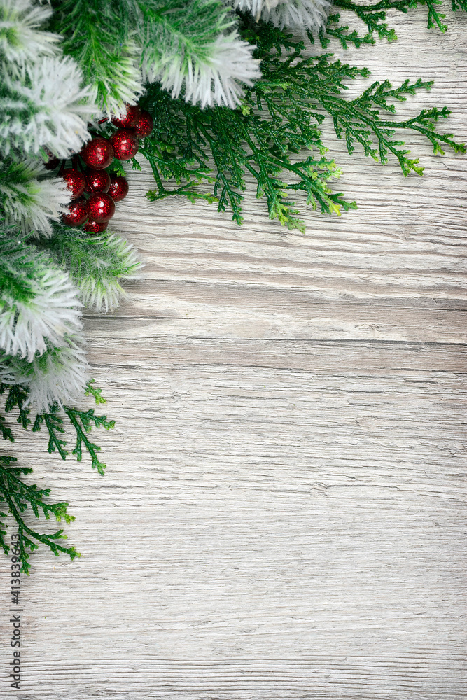 fir tree branches and ornaments . Christmas border design on the wooden background. Top view. Flat lay. Copy space fir tree branches and ornaments . Christmas border design on the wooden background. Top view. Flat lay. Copy space