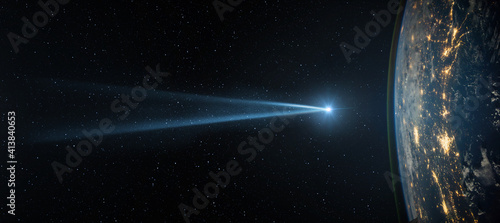 Fototapeta Naklejka Na Ścianę i Meble -  Comet, asteroid, meteorite flying to the planet Earth against the background of the starry night sky. Asteroid and the tail of a falling comet flying to Earth. Elements of this image courtesy of NASA.