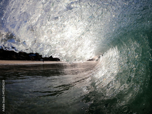 Viewer's POV inside a Breaking wave during Sunrise with Pristine Condi photo