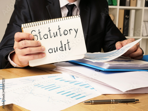 Slika na platnu Statutory audit is shown on the conceptual photo