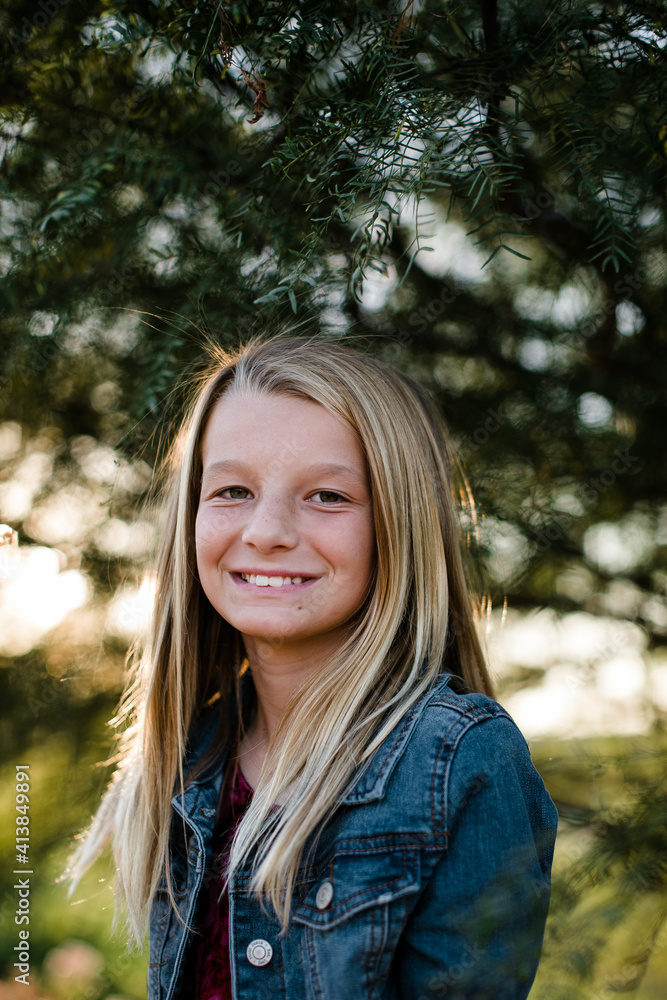 Young Girl Smiling Softly at Camera in Southern California Young Girl Smiling Softly at Camera in Southern California