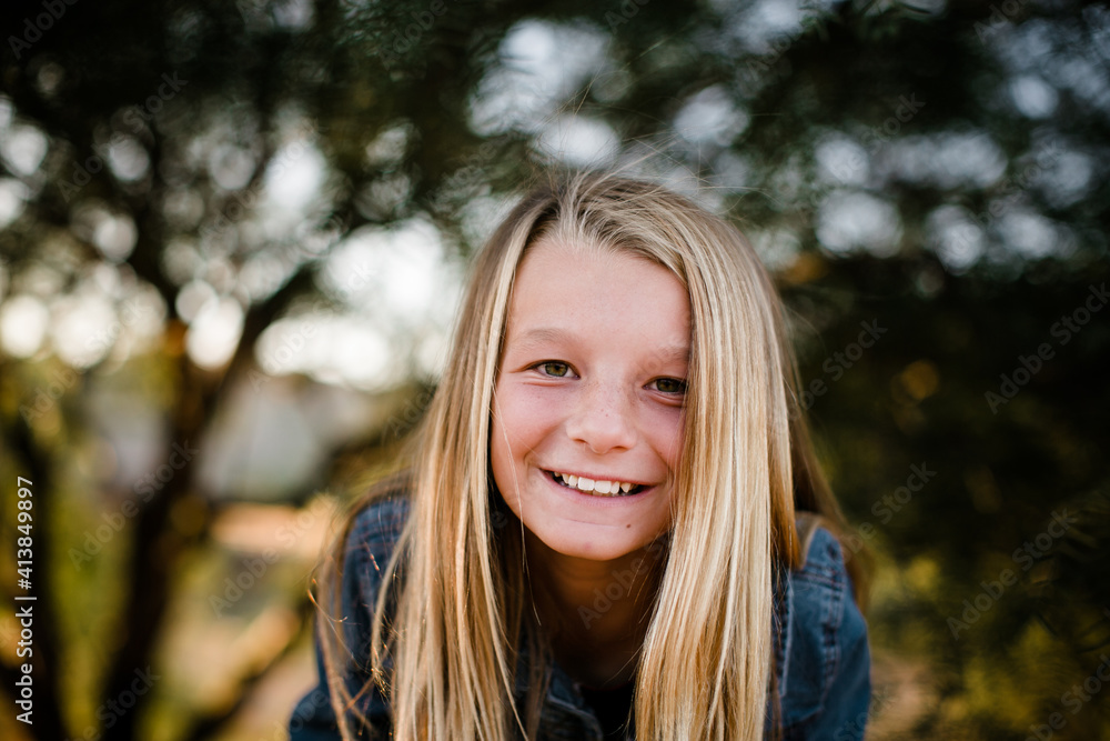 Young Girl Smiling at Camera in Southern California Young Girl Smiling at Camera in Southern California