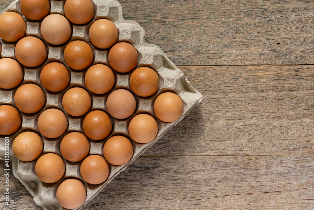 Chicken eggs in a carton. Flat lay. Chicken eggs in a carton. Flat lay.