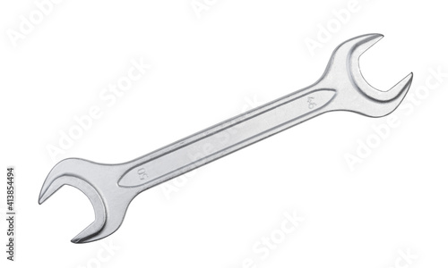 Metal wrench isolated on white.