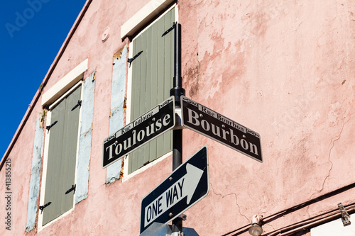 Bourbon and Toulouse street signs in the French Quarter in New Orleans, Louisiana