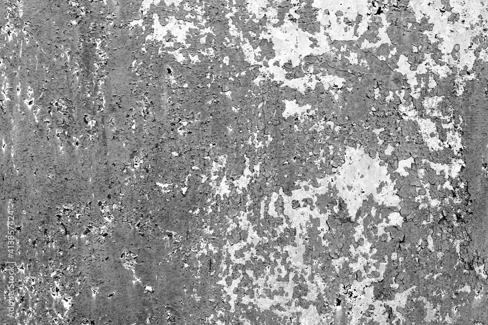 Metal texture with scratches and cracks which can be used as a background Metal texture with scratches and cracks which can be used as a background