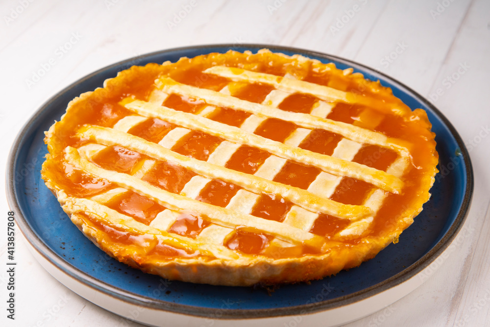 Baked Crostata with peach jam. Traditional italian recipe. Baked Crostata with peach jam. Traditional italian recipe.
