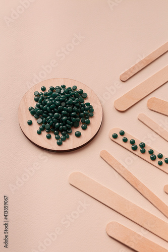 Green Pearl Hard Wax Beans for depilation background