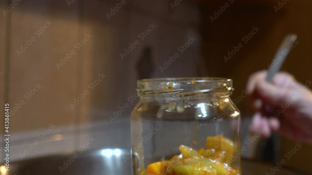 Pouring homemade mixed vegetable (Güveç) into sterile jars - (4K) Pouring homemade mixed vegetable (Güveç) into sterile jars - (4K)